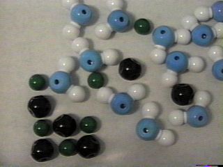 Models showing mixed water molecules and ionic solute.